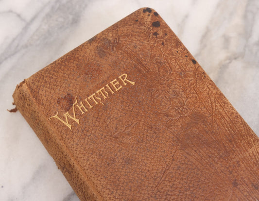 Lot 108 - Whittier's Poems Antique Poetry Book With Leather Cover, Gold Embossed Lettering And Embossed Flower Design On Covers And Spine, With Engraved Portrait Of Whittier Frontispiece, Red And Gold Fore Edge, Hurst And Company, Publishers, New York