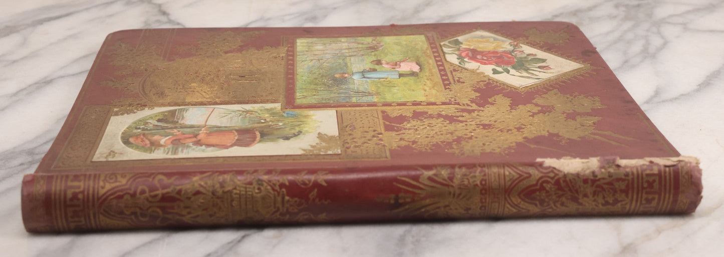Lot 115 - Antique Victorian Scrapbook Album With Children, Flowers, Foliage On Cover Containing 50+ Pieces Including Trade Cards, Die Cuts, Calling Cards, And Other Scraps