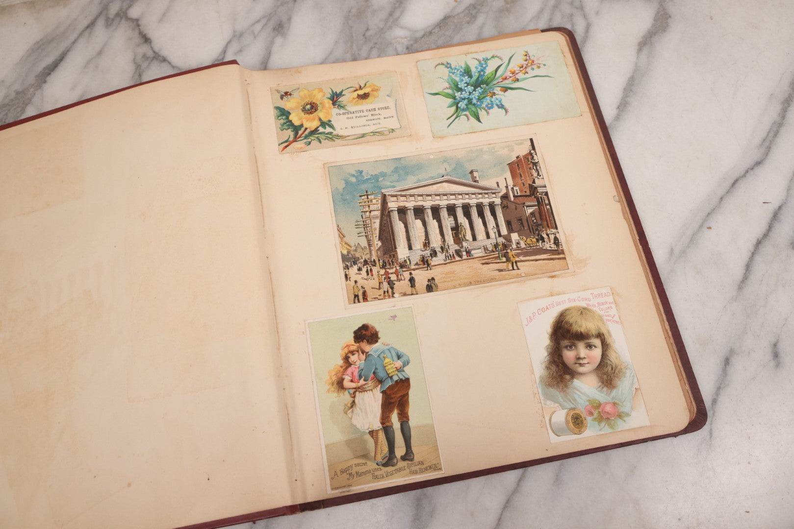 Lot 115 - Antique Victorian Scrapbook Album With Children, Flowers, Foliage On Cover Containing 50+ Pieces Including Trade Cards, Die Cuts, Calling Cards, And Other Scraps