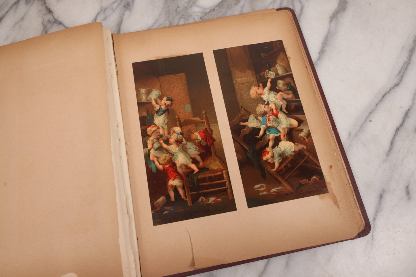 Lot 115 - Antique Victorian Scrapbook Album With Children, Flowers, Foliage On Cover Containing 50+ Pieces Including Trade Cards, Die Cuts, Calling Cards, And Other Scraps