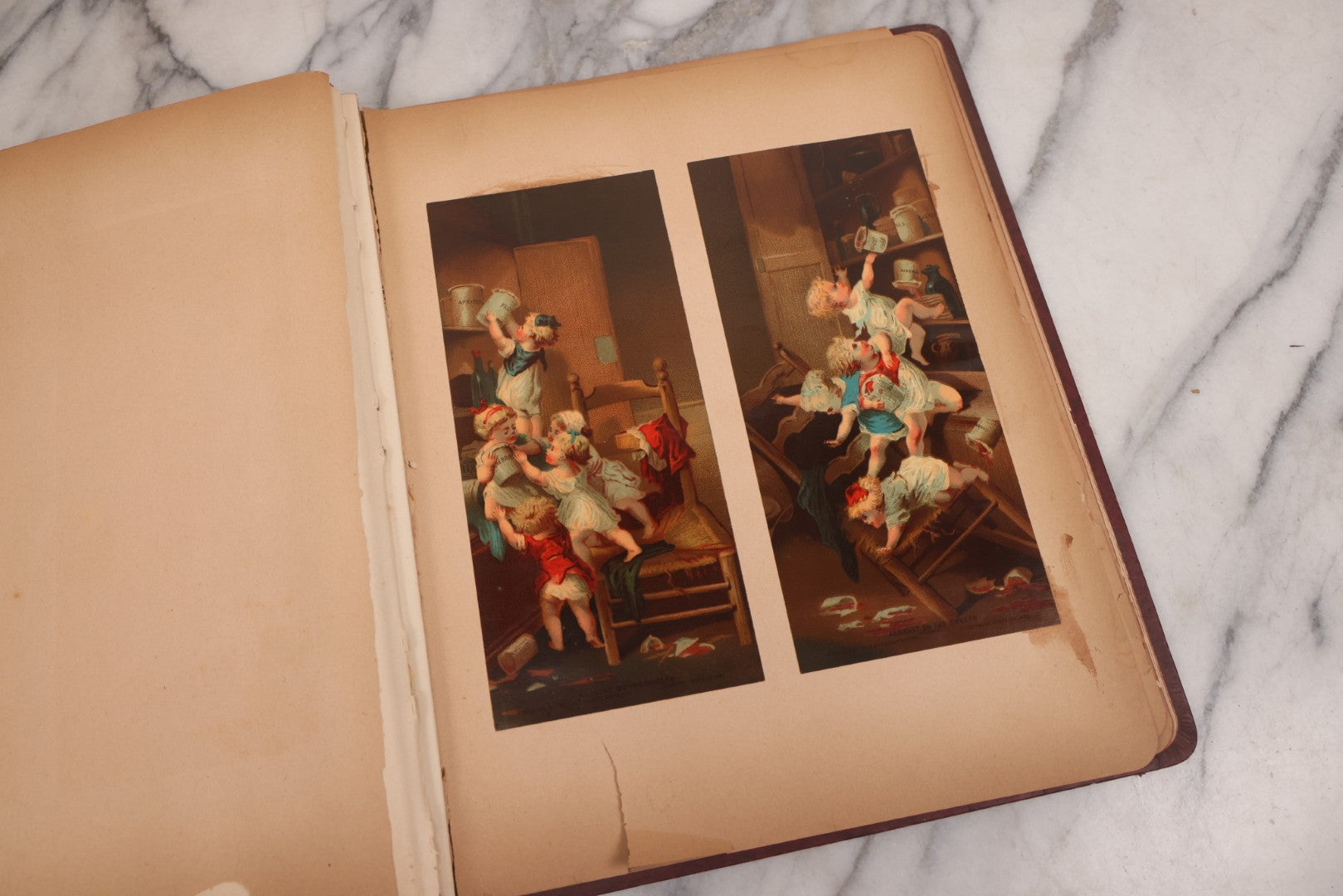 Lot 115 - Antique Victorian Scrapbook Album With Children, Flowers, Foliage On Cover Containing 50+ Pieces Including Trade Cards, Die Cuts, Calling Cards, And Other Scraps