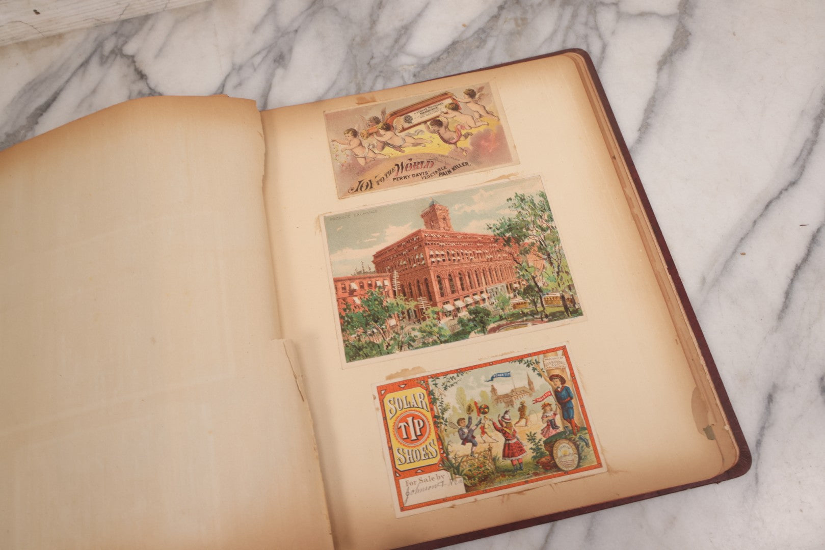 Lot 115 - Antique Victorian Scrapbook Album With Children, Flowers, Foliage On Cover Containing 50+ Pieces Including Trade Cards, Die Cuts, Calling Cards, And Other Scraps