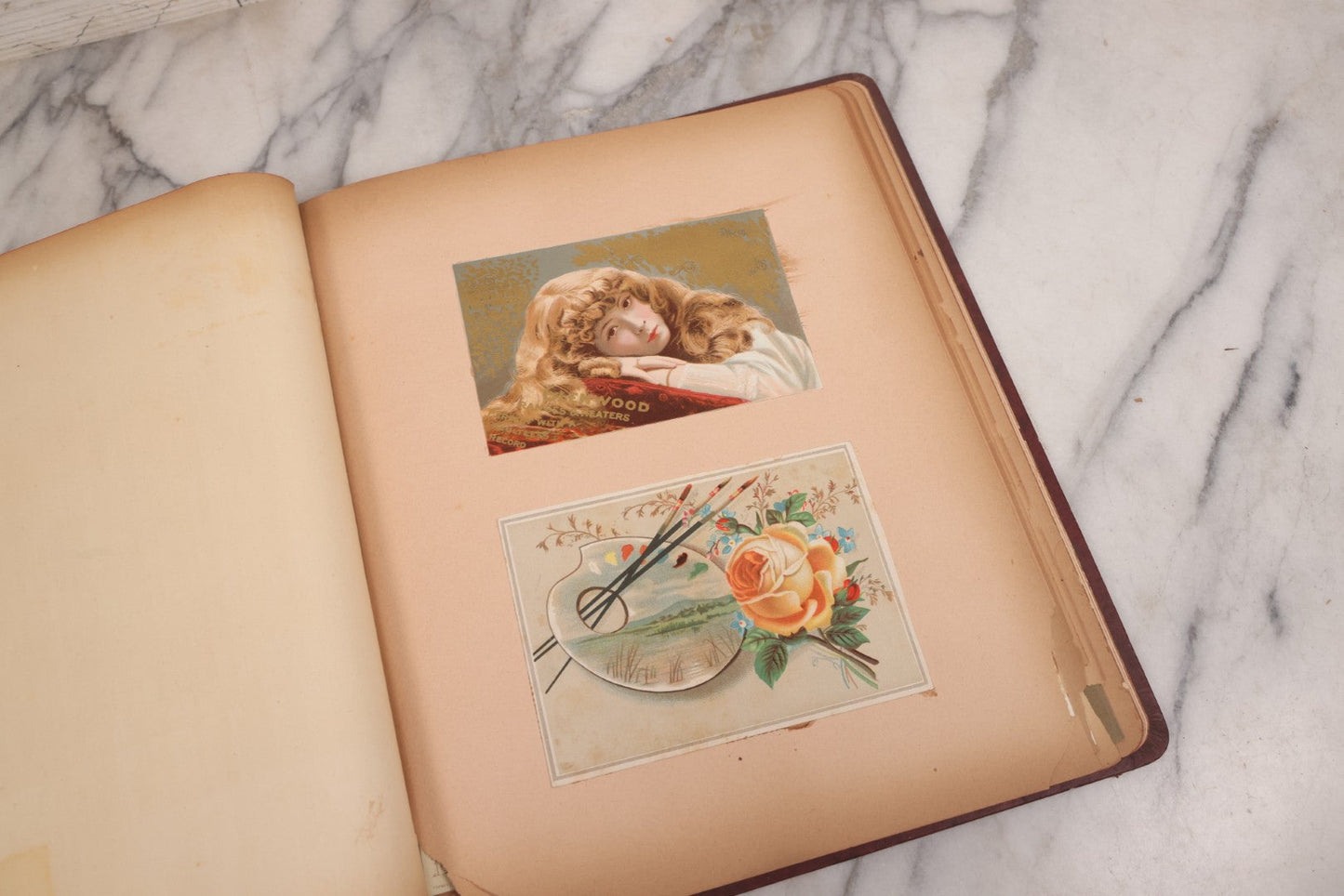 Lot 115 - Antique Victorian Scrapbook Album With Children, Flowers, Foliage On Cover Containing 50+ Pieces Including Trade Cards, Die Cuts, Calling Cards, And Other Scraps