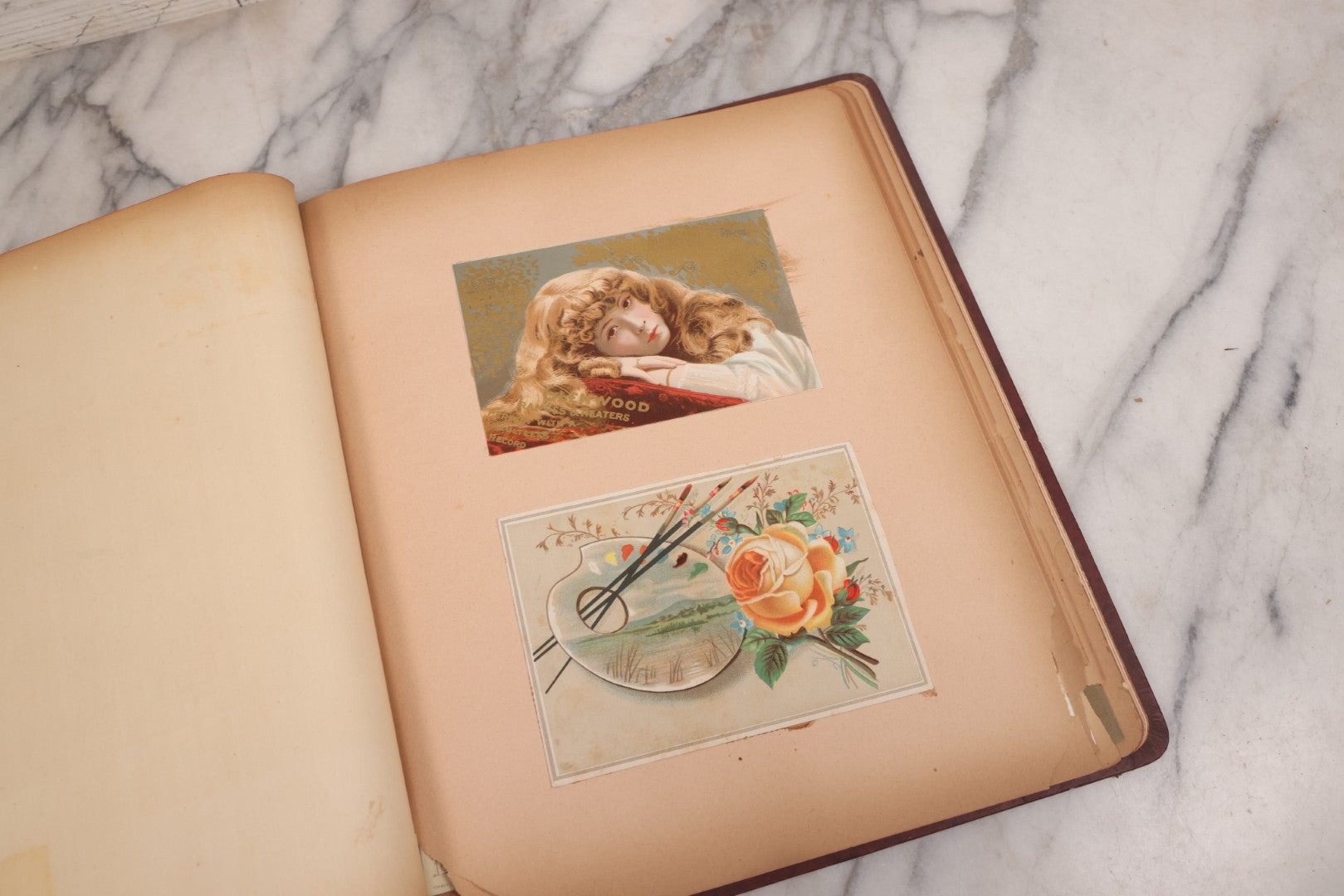 Lot 115 - Antique Victorian Scrapbook Album With Children, Flowers, Foliage On Cover Containing 50+ Pieces Including Trade Cards, Die Cuts, Calling Cards, And Other Scraps