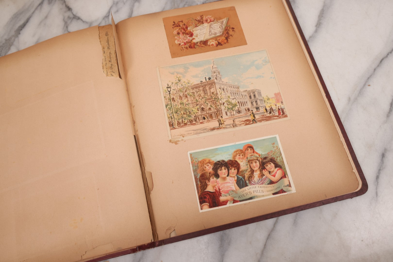 Lot 115 - Antique Victorian Scrapbook Album With Children, Flowers, Foliage On Cover Containing 50+ Pieces Including Trade Cards, Die Cuts, Calling Cards, And Other Scraps
