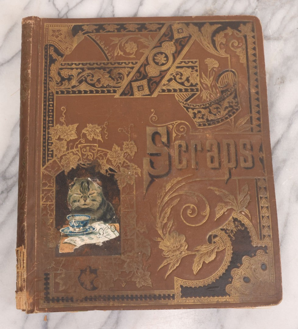 Lot 116 - Antique Victorian Scrapbook Album With Cat, Other Designs On Cover Containing 100+ Pieces Including Trade Cards, Die Cuts, Calling Cards, And Other Scraps