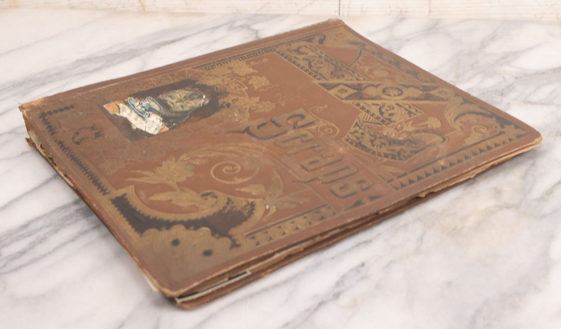 Lot 116 - Antique Victorian Scrapbook Album With Cat, Other Designs On Cover Containing 100+ Pieces Including Trade Cards, Die Cuts, Calling Cards, And Other Scraps