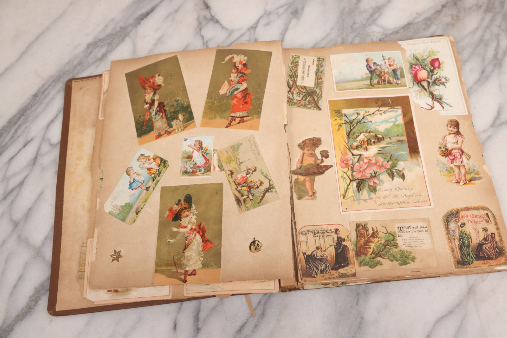 Lot 116 - Antique Victorian Scrapbook Album With Cat, Other Designs On Cover Containing 100+ Pieces Including Trade Cards, Die Cuts, Calling Cards, And Other Scraps