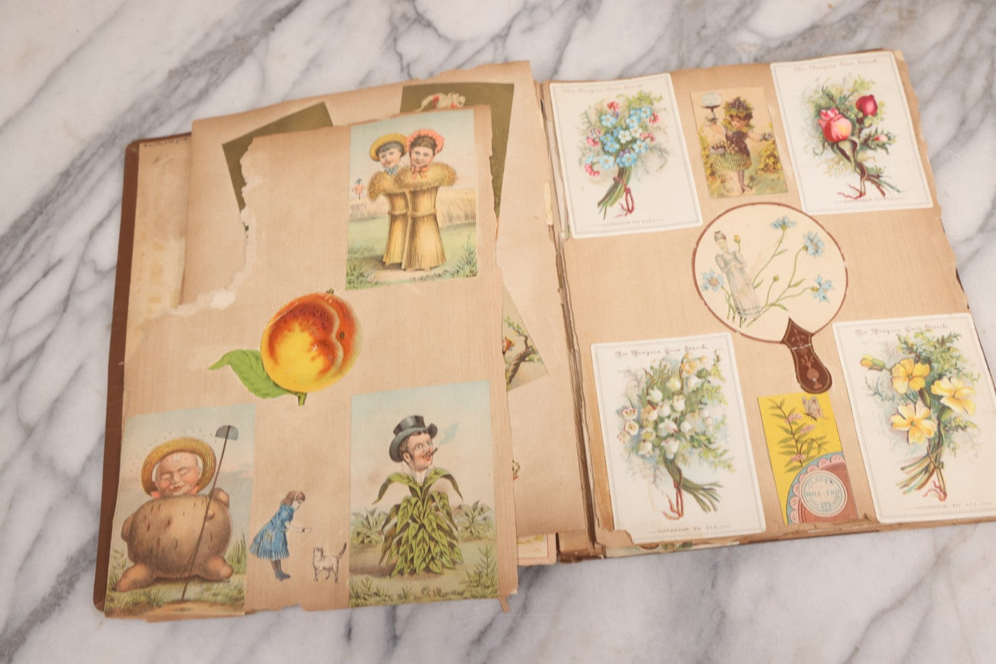 Lot 116 - Antique Victorian Scrapbook Album With Cat, Other Designs On Cover Containing 100+ Pieces Including Trade Cards, Die Cuts, Calling Cards, And Other Scraps