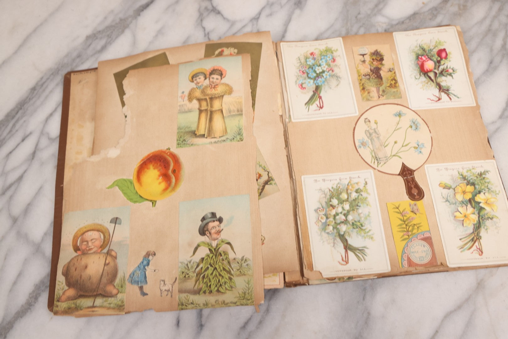 Lot 116 - Antique Victorian Scrapbook Album With Cat, Other Designs On Cover Containing 100+ Pieces Including Trade Cards, Die Cuts, Calling Cards, And Other Scraps