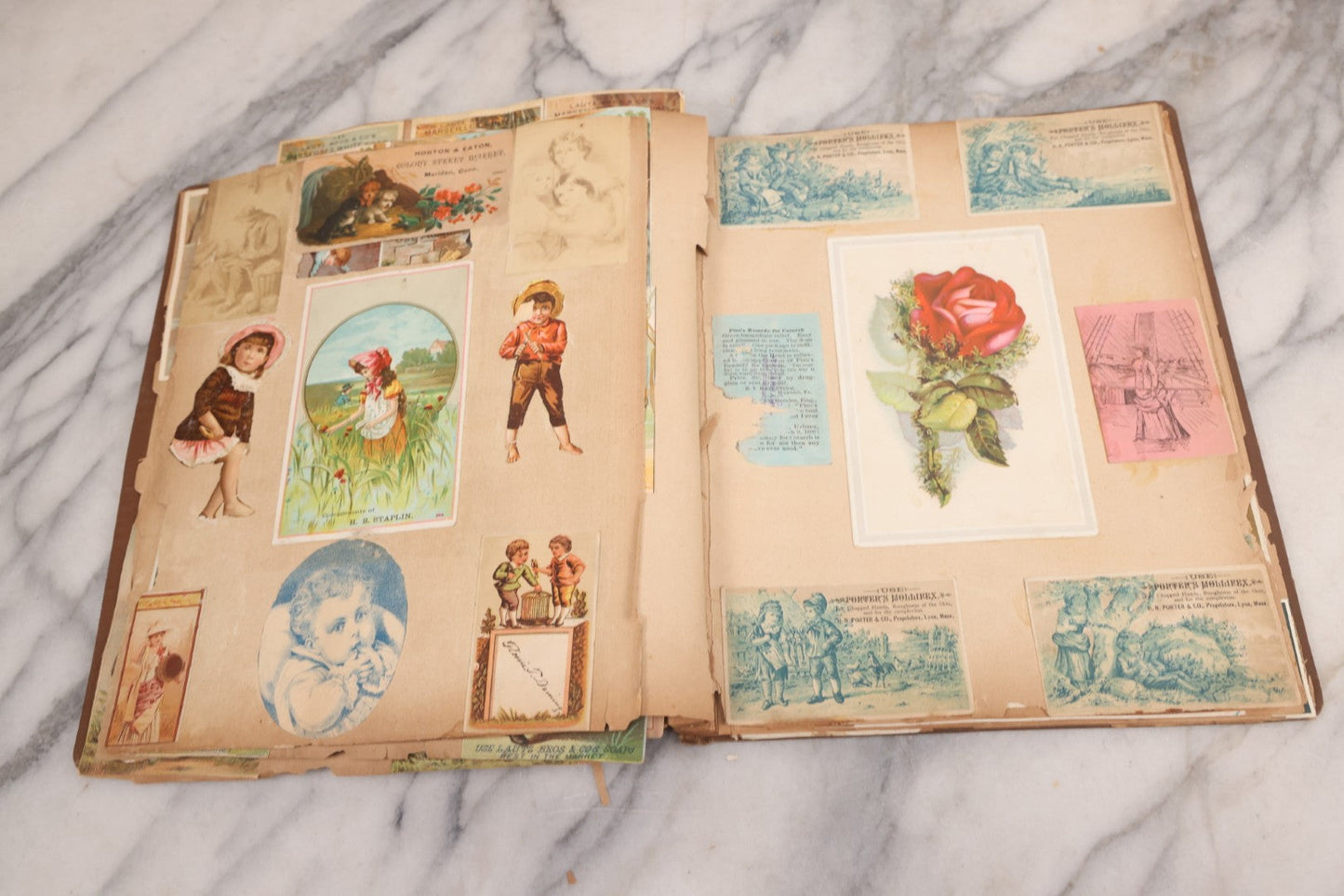 Lot 116 - Antique Victorian Scrapbook Album With Cat, Other Designs On Cover Containing 100+ Pieces Including Trade Cards, Die Cuts, Calling Cards, And Other Scraps