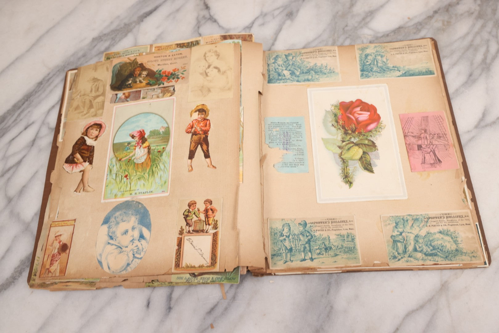 Lot 116 - Antique Victorian Scrapbook Album With Cat, Other Designs On Cover Containing 100+ Pieces Including Trade Cards, Die Cuts, Calling Cards, And Other Scraps
