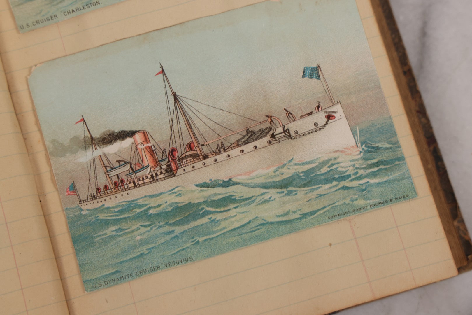 Lot 118 - Antique Scrapbook Album Made From An Old Cash Book Ledger Containing 15 Lithographed Card Featuring United States Battleships Of The Spanish American War Era, Cards Copyright 1898 By Koerner & Hayes, With Four Additional Cards, Doodles, Etc.