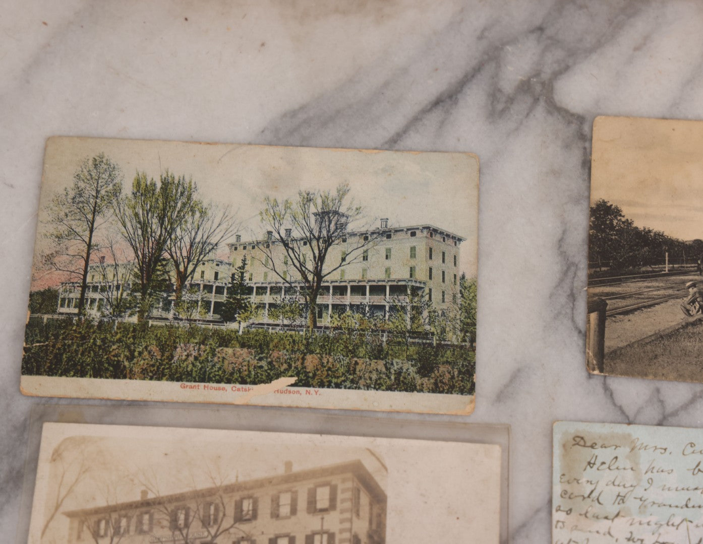 Lot 125 - Grouping Of Thirteen Mixed Miscellaneous Postcards Including R.P.P.C. Of Logging Train, Scenes From Wisconsin, White Star Liner "Canopic," Francis Willey & Co. Mill, Massachusetts, And More