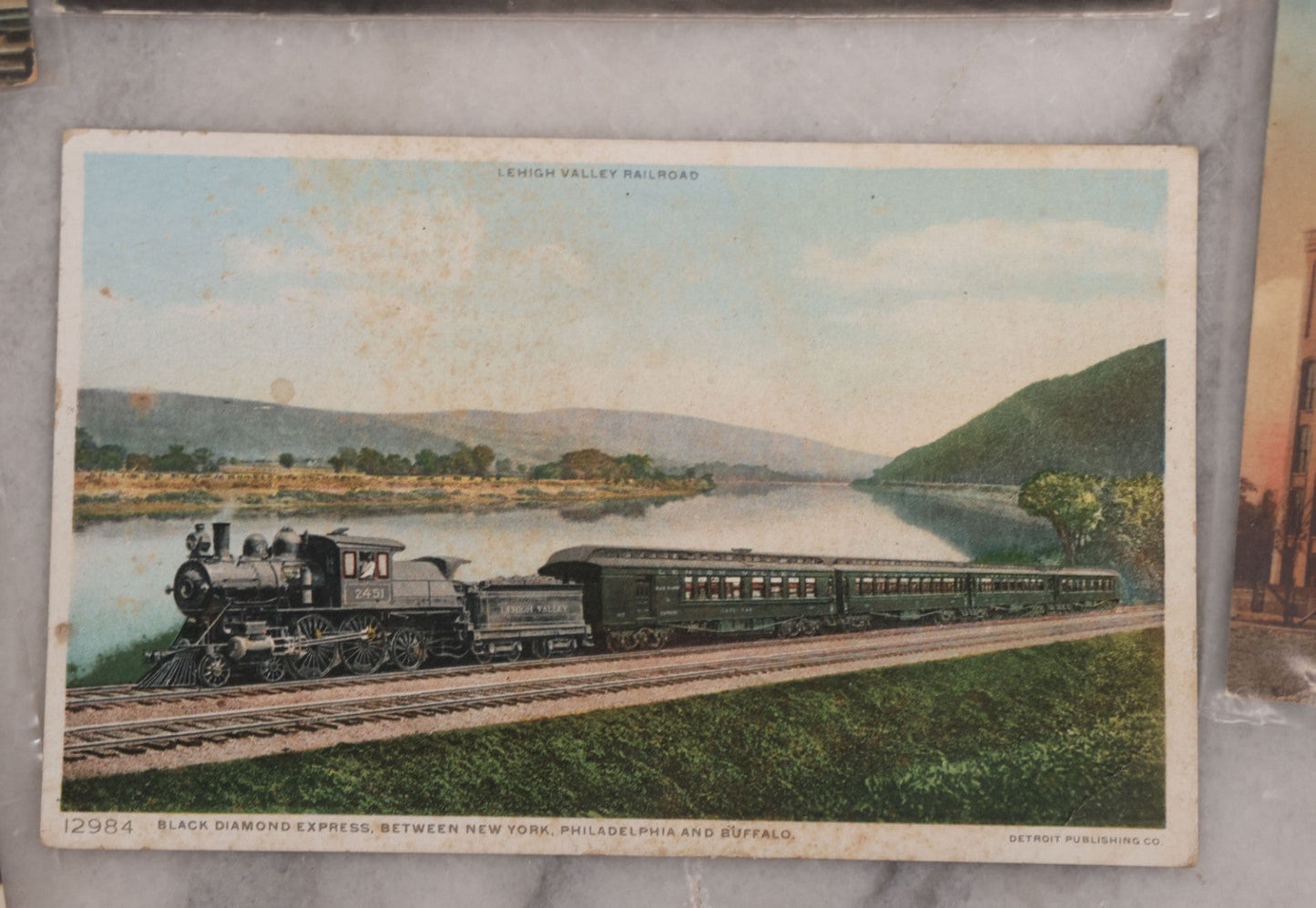 Lot 125 - Grouping Of Thirteen Mixed Miscellaneous Postcards Including R.P.P.C. Of Logging Train, Scenes From Wisconsin, White Star Liner "Canopic," Francis Willey & Co. Mill, Massachusetts, And More
