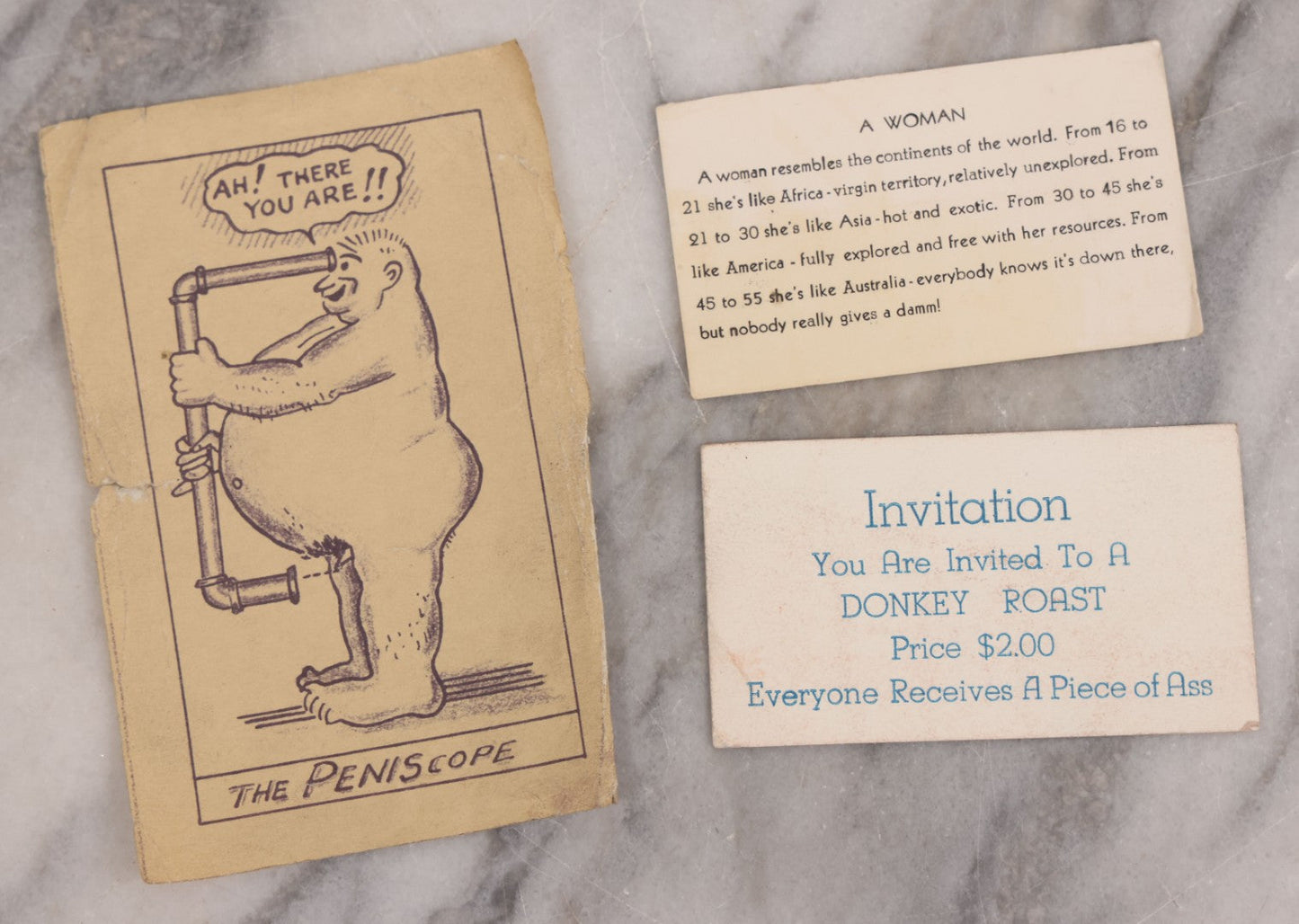 Lot 126 - Grouping Of Three Antique And Vintage Humorous Novelty Scraps Including Invitation To A Donkey Roast, "Everyone Receives A Piece Of Ass," The "Peniscope" Printed Illustration, "A Woman" Card