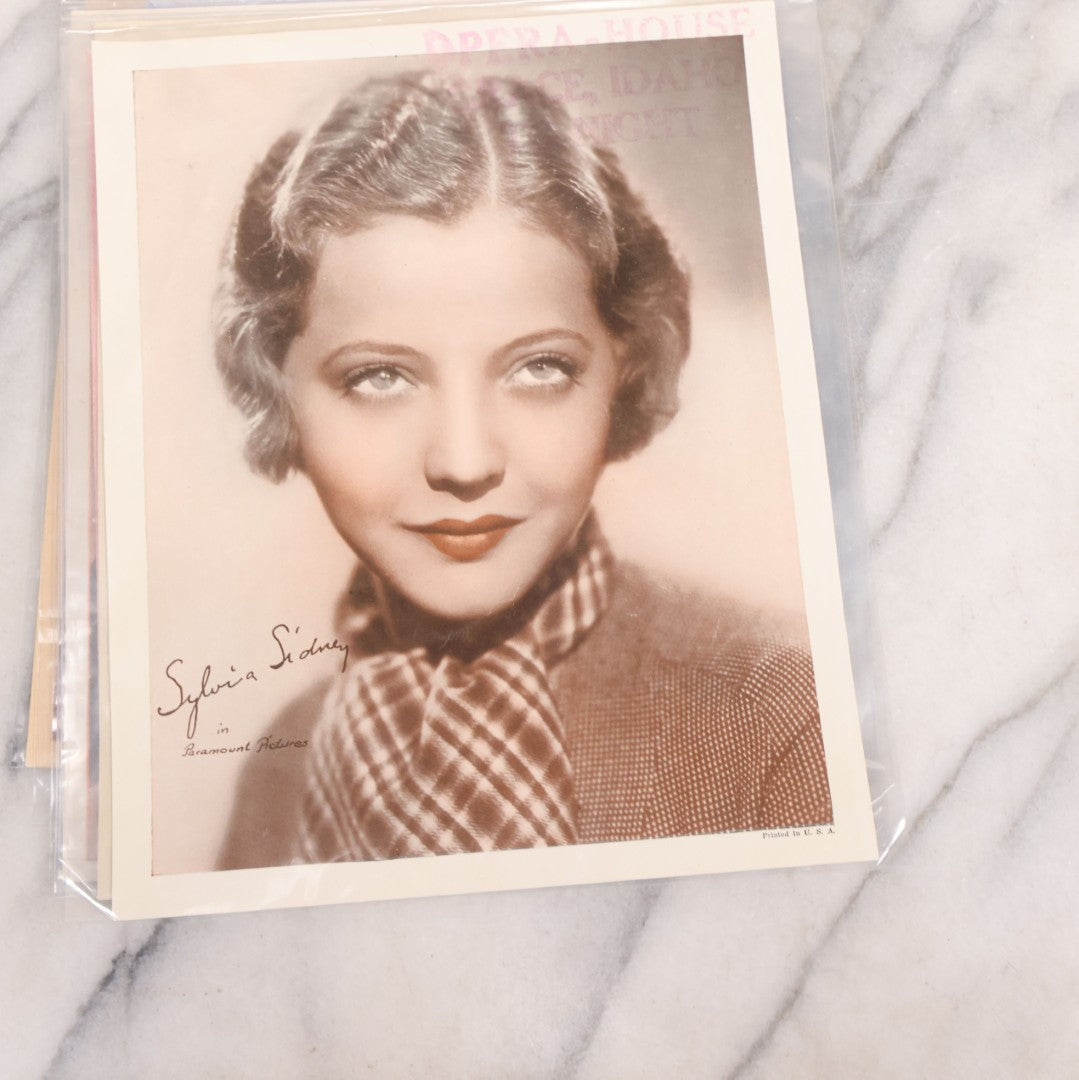 Lot 128 - Grouping Of Eight Large Format Photo Prints, Movie Stars And Metro-Goldwyn-Mayer Pictures Film Stars Series, Including Katharine Hepburn (1907-2003) Rko Radio Star, Shirley Temple (1928-2014), And James Stewart (1908-1997)