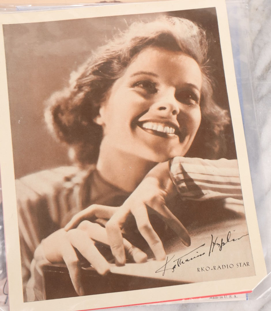 Lot 128 - Grouping Of Eight Large Format Photo Prints, Movie Stars And Metro-Goldwyn-Mayer Pictures Film Stars Series, Including Katharine Hepburn (1907-2003) Rko Radio Star, Shirley Temple (1928-2014), And James Stewart (1908-1997)