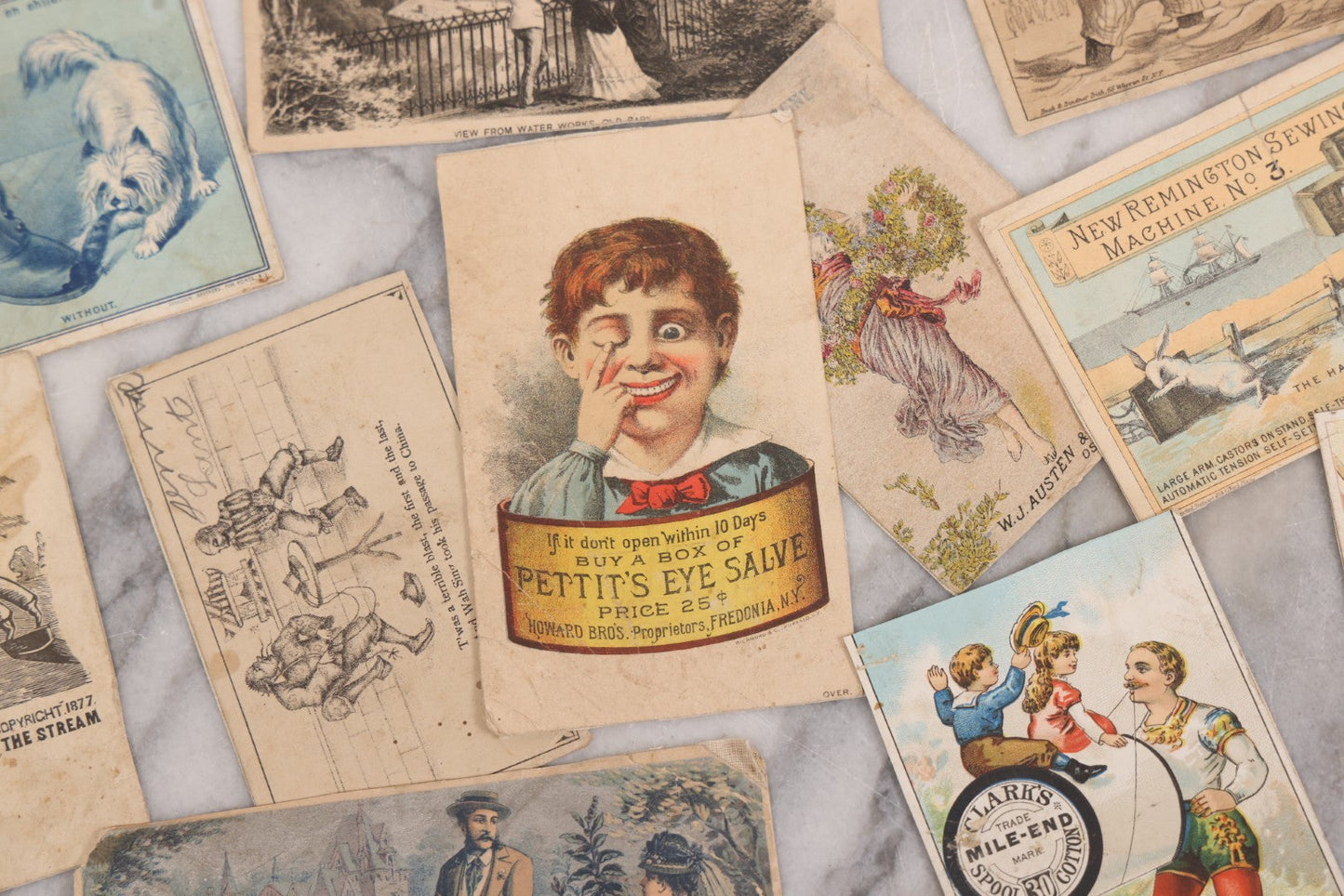 Lot 131 - Grouping Of Fifteen Antique Lithographed Trade Cards Cut From Scrap Albums, Including Petit's Eye Salve, Others, Note All Have Paper Pasted To Backs