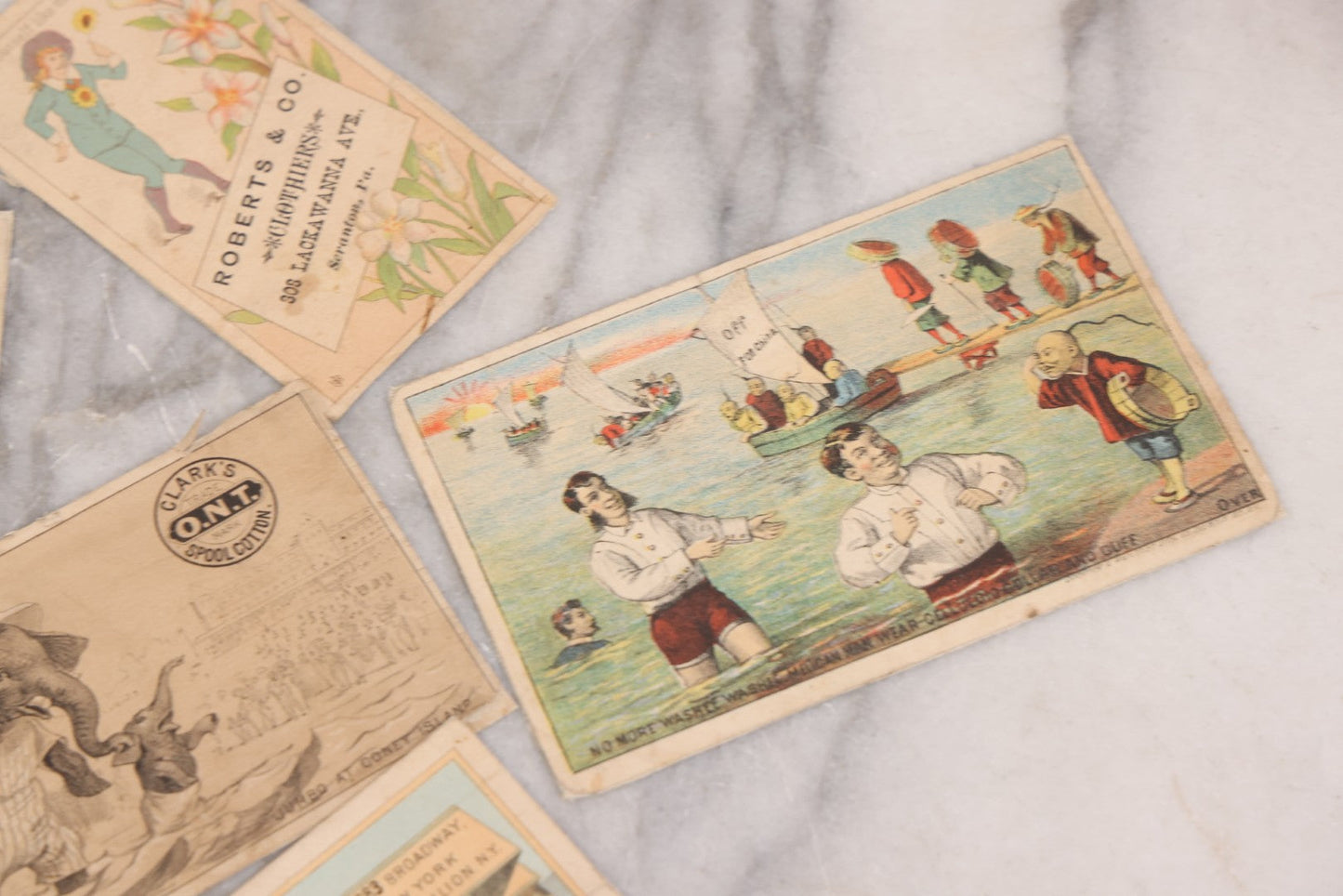 Lot 131 - Grouping Of Fifteen Antique Lithographed Trade Cards Cut From Scrap Albums, Including Petit's Eye Salve, Others, Note All Have Paper Pasted To Backs