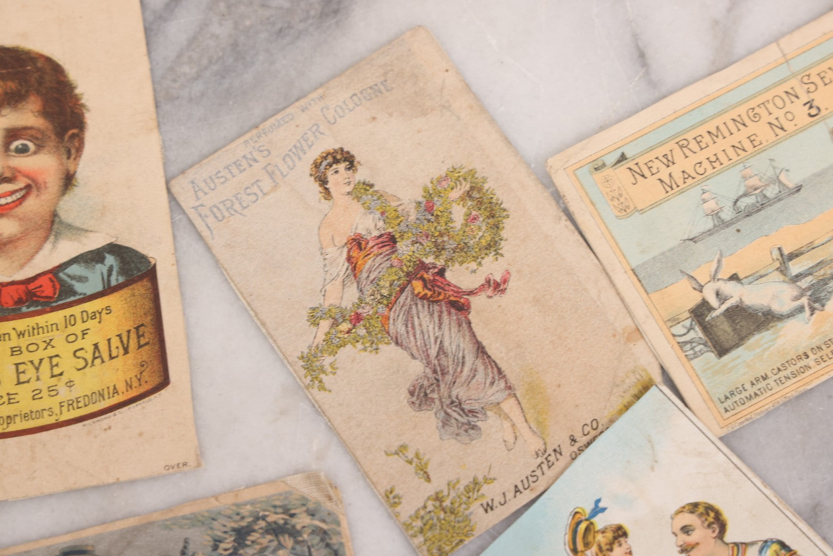 Lot 131 - Grouping Of Fifteen Antique Lithographed Trade Cards Cut From Scrap Albums, Including Petit's Eye Salve, Others, Note All Have Paper Pasted To Backs