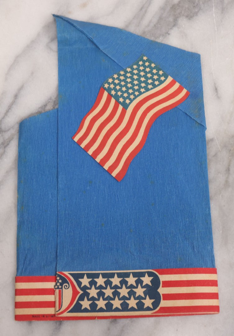 Lot 133 - Antique Folded Crepe Paper Patriotic Holiday Hat With American Flags, Red, White, And Blue Coloring, Made In Germany, As Found