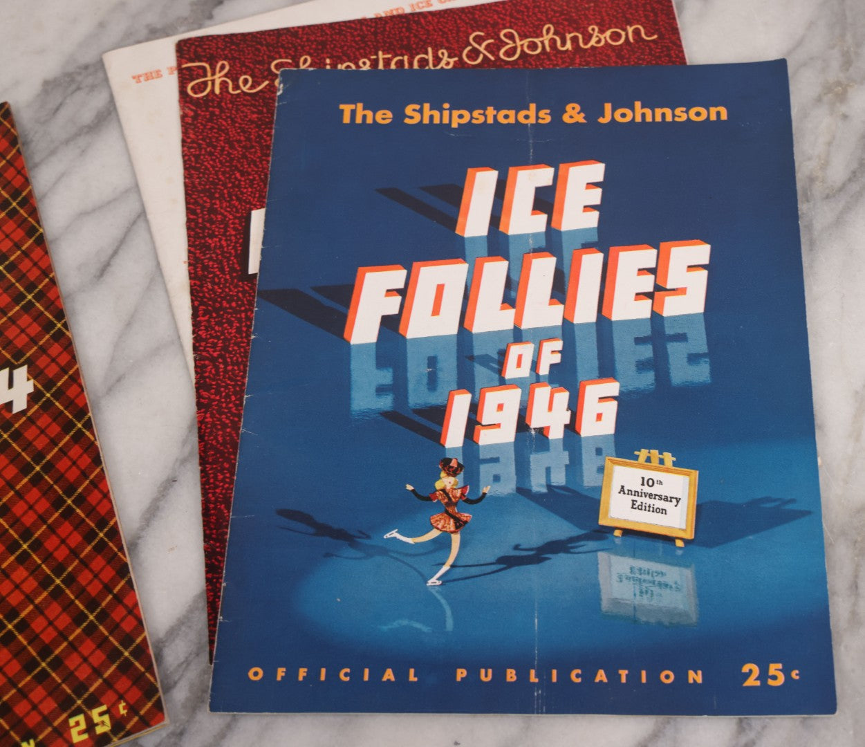 Lot 140 - Grouping Of Four Vintage Ice Follies Magazine Programs (1944, 1945, And 1946), And Ice Cycles Program (1946), With Illustrations And Black And White Photography Of Performers And Scenes Throughout, Shipstads & Johnson, Producers