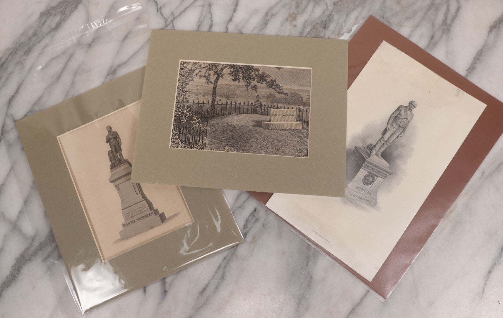 Lot 142 - Vintage Three Piece Daniel Webster Ephemera Grouping, Including Matted Prints Of Central Park Statue By Thomas Ball And Engraving Of Webster Tomb, And Print Of National Statuary Hall Statue By Carl Conrads