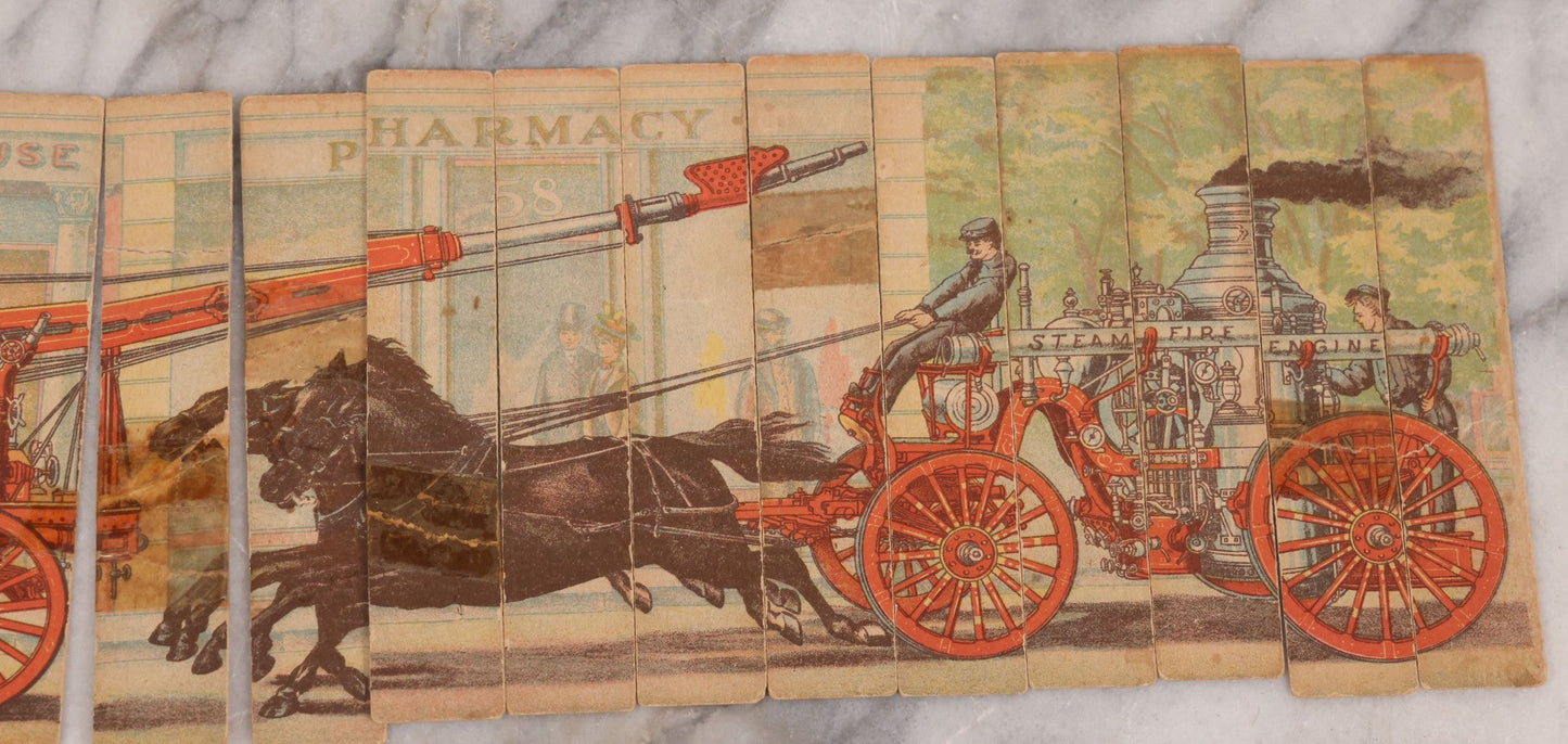 Lot 145 - Pair of Vintage Cardboard Firefighting Jigsaw Puzzles, Thin Vertical Pieces Depicting Early Fire Trucks, Firefighters, And Horses, Note Damage