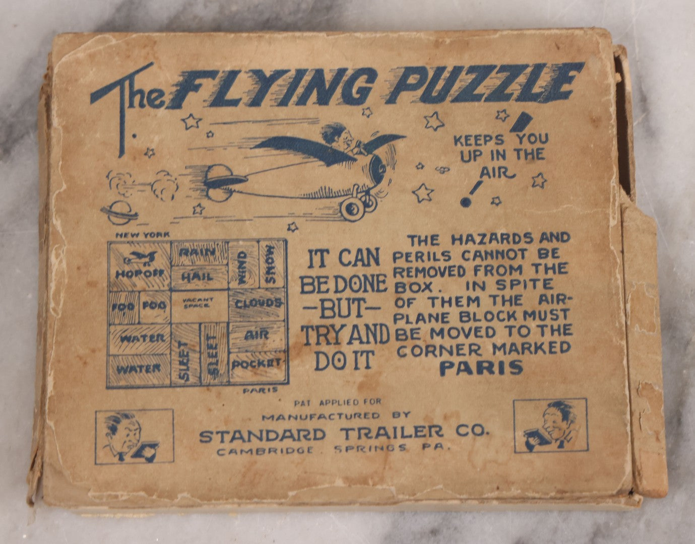 Lot 146 - Pair Of Vintage Miniature Puzzle Games Including "Kreuzer Brecher - The Cross Puzzle" And "The Flying Puzzle" By Standard Trailer Co., Cambridge Springs, Pennsylvania, Note Both Appear To Be Incomplete