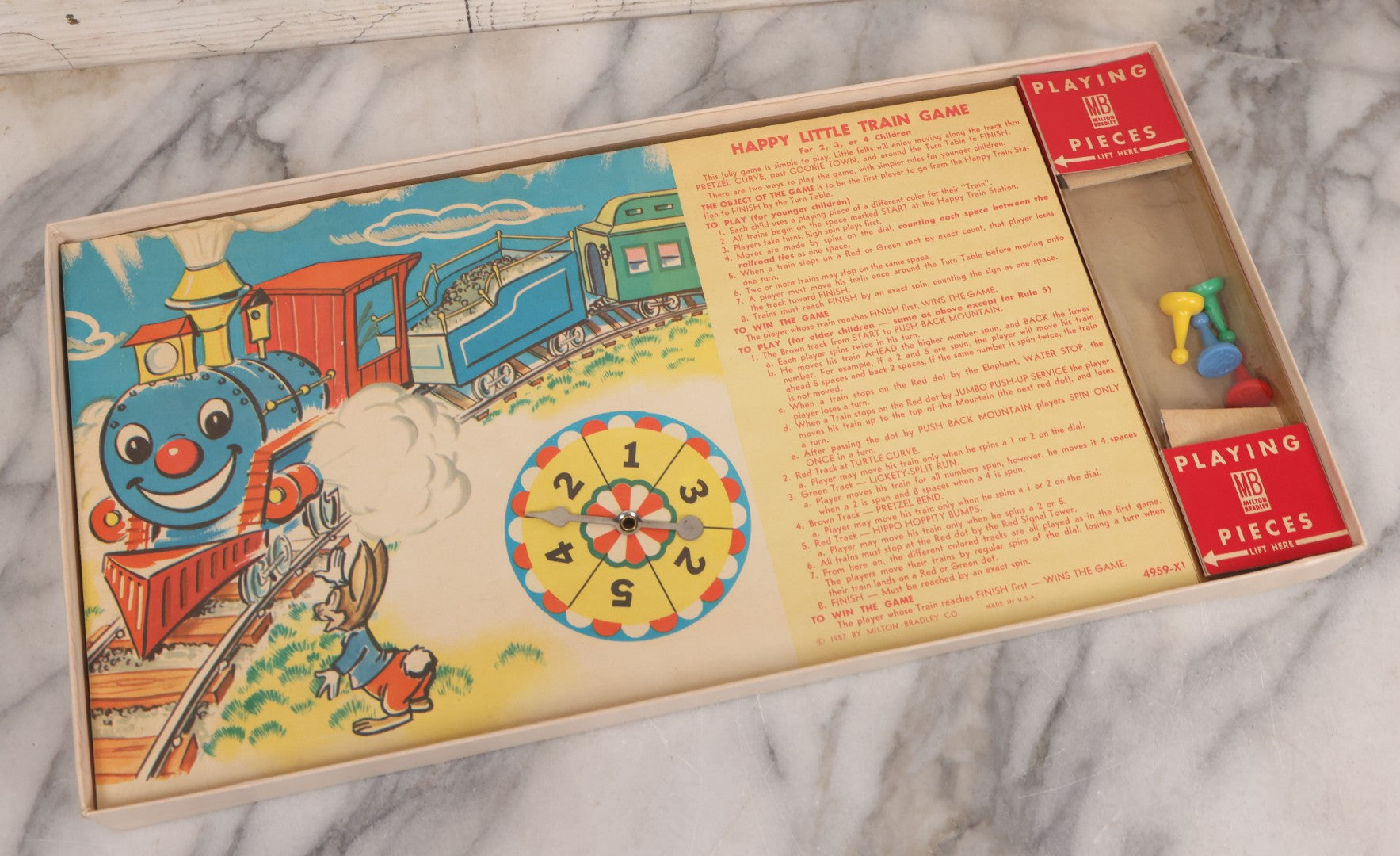 Lot 148 - Vintage "The Happy Little Train Game" Board Game By Milton Bradley Company, Copyright 1957, With Board And Game Pieces