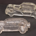 Lot 157 - Pair Of Vintage Clear Glass Automobile Candy Containers