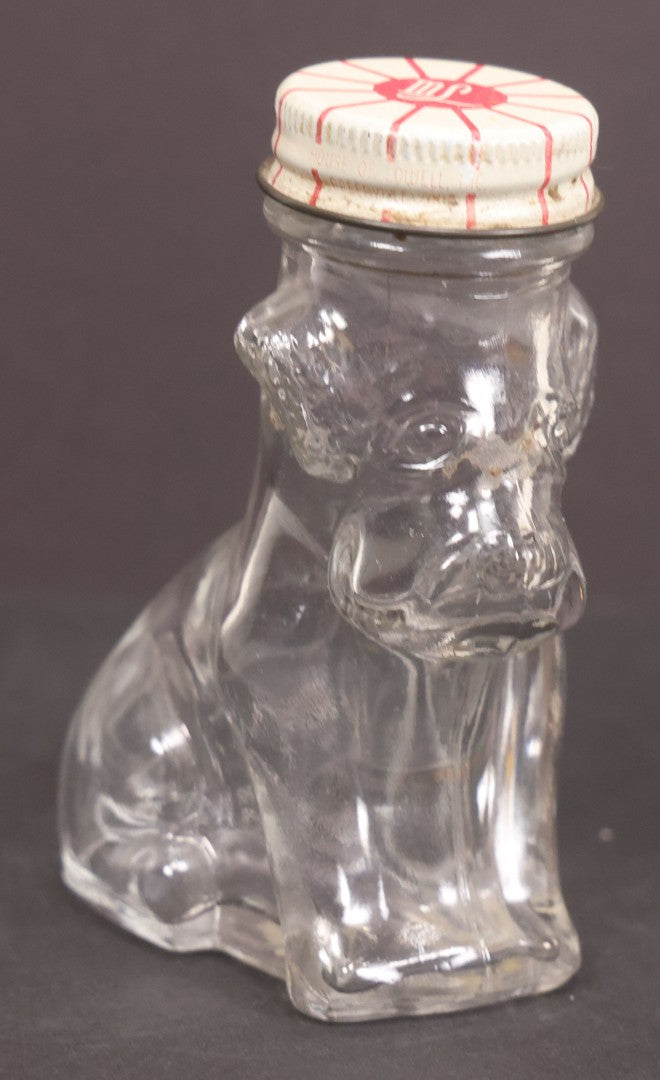 Lot 161 - Vintage Clear Glass Scottie Dog Candy Container With Original White And Red Metal "M.L." Twist Cap, 3-5/8" Height