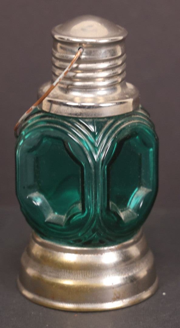 Lot 164 - Vintage Teal Glass Lantern Candy Container With Fixed Metal Base And Twist Off Metal Top With Wire Hanger, 4" Height