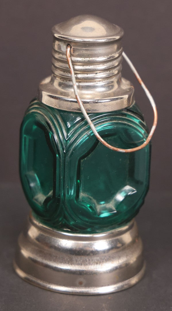 Lot 164 - Vintage Teal Glass Lantern Candy Container With Fixed Metal Base And Twist Off Metal Top With Wire Hanger, 4" Height