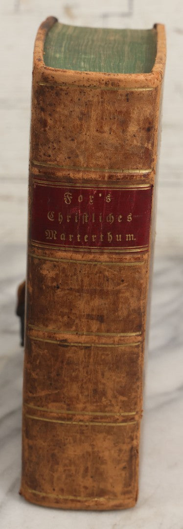 Lot 003 - Foxe's Book Of Martyrs, "History Of Christian Martyrdom, [...] The Lives, Sufferings, And Glorious Deaths Of Martyrs" By John Foxe, Illustrated With Gruesome Engravings, German Language, George W. Ment And Son, Publishers, Philadelphia, 1840
