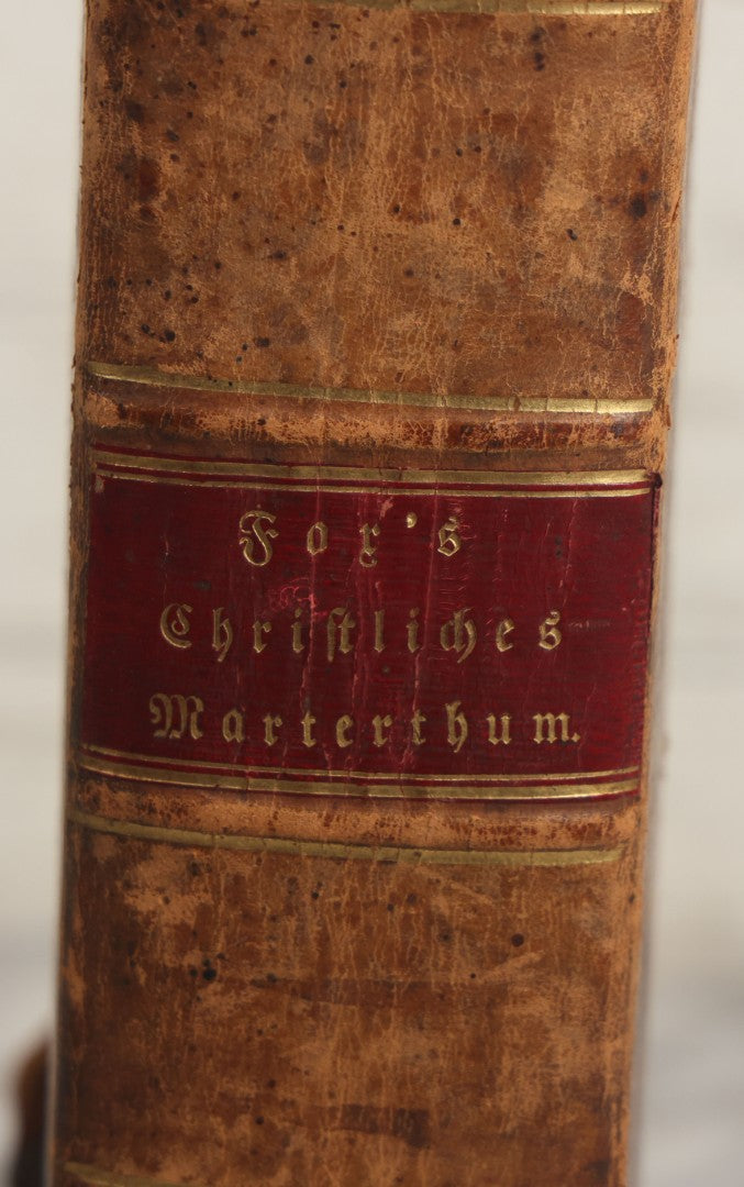 Lot 003 - Foxe's Book Of Martyrs, "History Of Christian Martyrdom, [...] The Lives, Sufferings, And Glorious Deaths Of Martyrs" By John Foxe, Illustrated With Gruesome Engravings, German Language, George W. Ment And Son, Publishers, Philadelphia, 1840