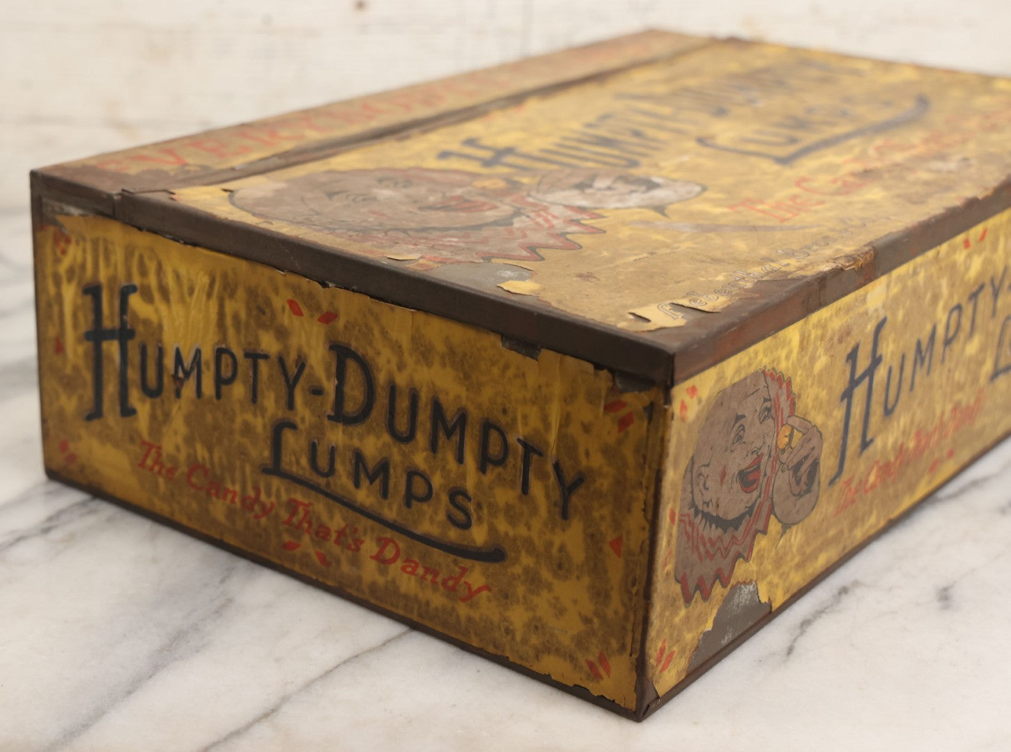 Lot 011 - Vintage Humpty-Dumpty Lumps, Cocoanut-Coated Candy Advertising Store Display Tin With Paper Labels, Clown Motif, "Everybody's Candy - The Candy That's Dandy," Liebenthal Bros. & Co., Note Severe Wear, Losses, Staining To Labels