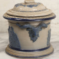 Lot 018 - Antique Molded Stoneware Humidor Vessel With Goat Ram Head Motif, Hunting Dog Scenes, Attributed To White's Pottery, Utica, New York, Circa Late Late 19th Century, 7-1/2" H