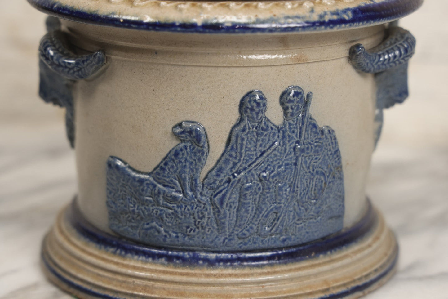 Lot 018 - Antique Molded Stoneware Humidor Vessel With Goat Ram Head Motif, Hunting Dog Scenes, Attributed To White's Pottery, Utica, New York, Circa Late Late 19th Century