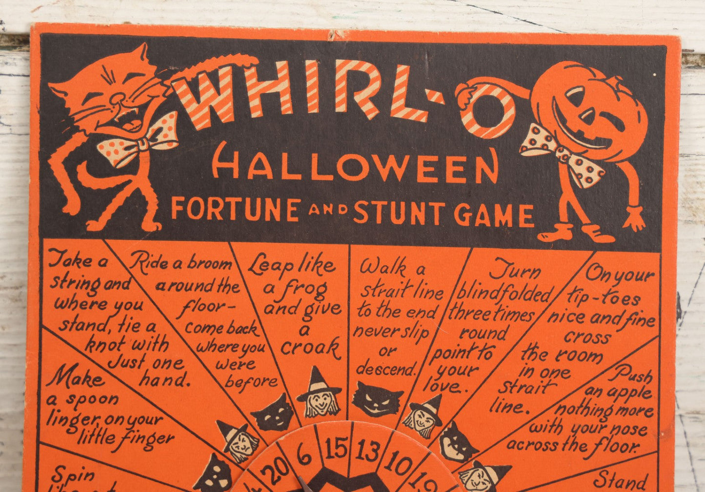 Lot 021 - Vintage Whirl-O Halloween Fortune And Stunt Game With Spinner, Laughing Cat And Pumpkin Motifs, "Whirl-O Fortunes" By Sandra Pearl, Manufactured By The Beistle Company, Made In U.S.A., Circa 1940s 