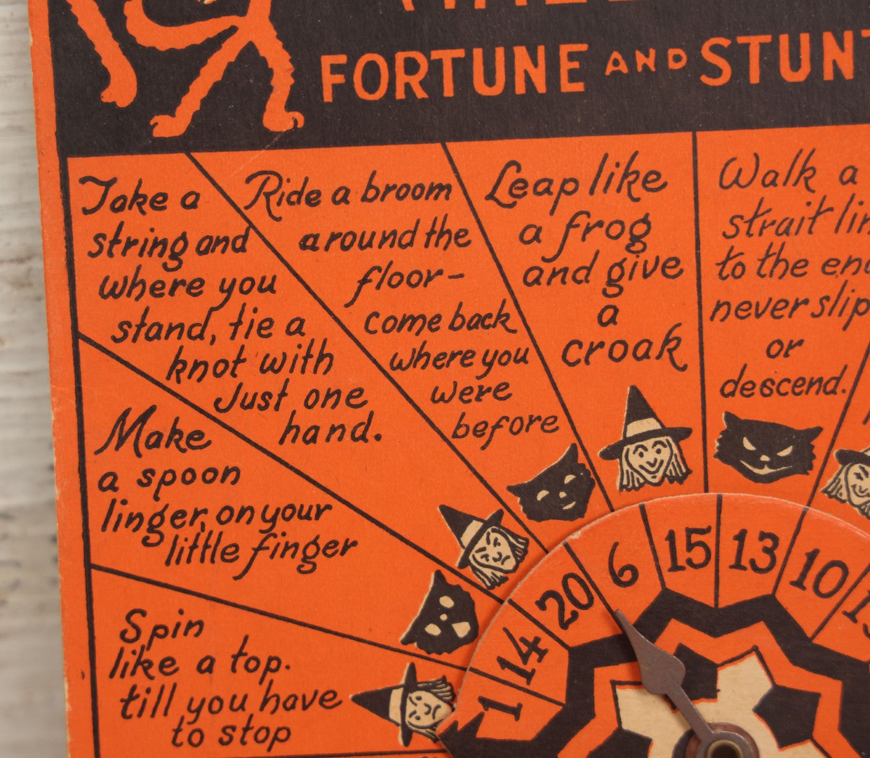 Lot 021 - Vintage Whirl-O Halloween Fortune And Stunt Game With Spinner, Laughing Cat And Pumpkin Motifs, "Whirl-O Fortunes" By Sandra Pearl, Manufactured By The Beistle Company, Made In U.S.A., Circa 1940s 