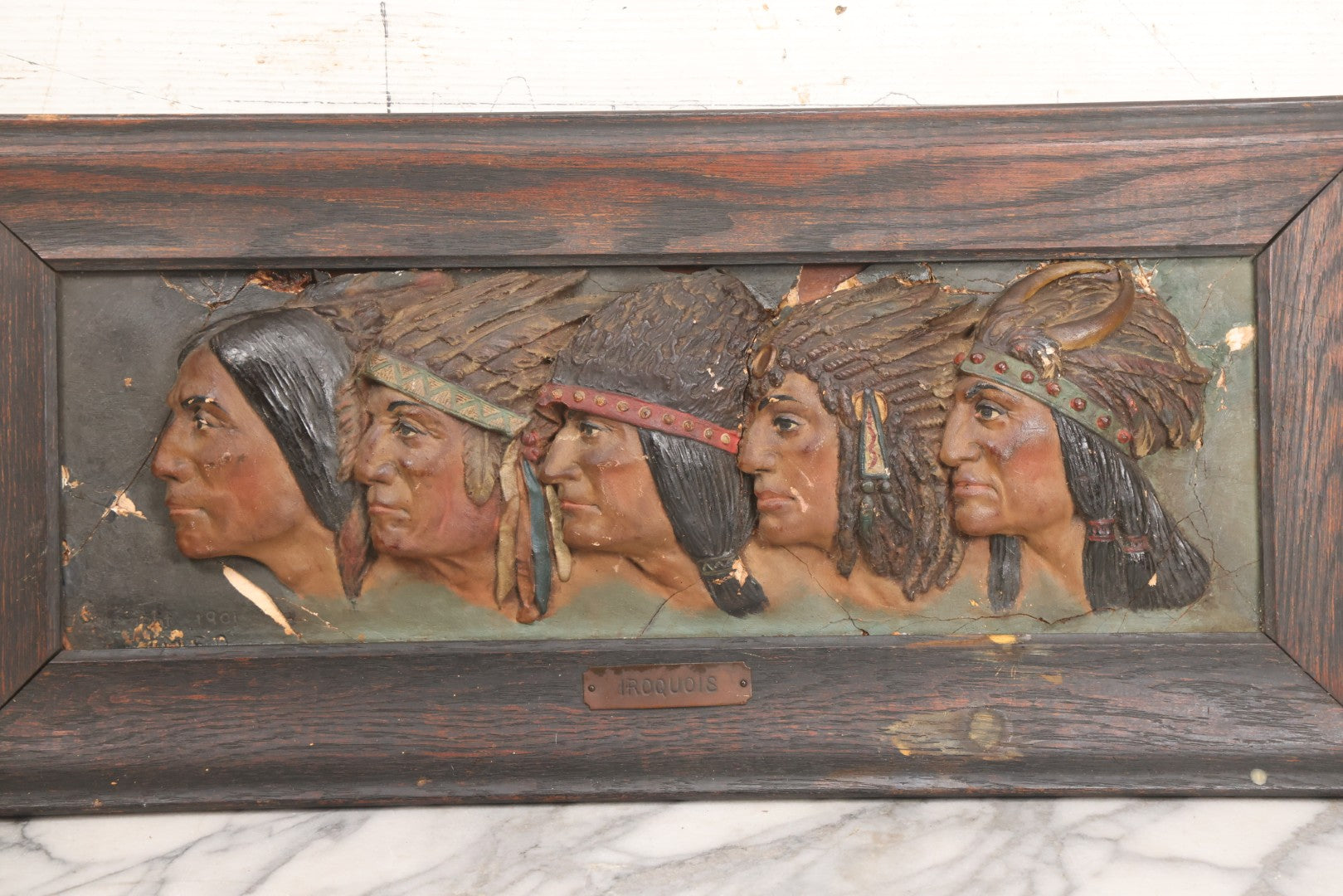 Lot 029 - Antique Chalkware Iroquois Native American Tribe Plaque In Frame, Copyright 1901, Note Very Badly Damaged