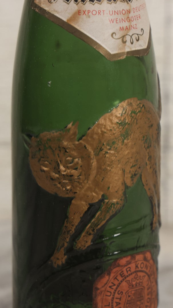 Lot 043 - Vintage Green Glass Embossed Wine Bottle With Painted Cat Motif, Zeller Schwarze Katz, Light Mosel Wine, Product, Bottled, And Shipped By Export Union Deutscher Weinguter, Mainz, Germany, 1966