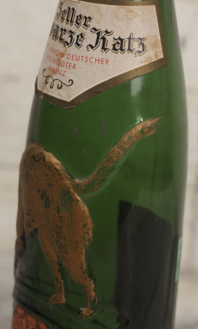 Lot 043 - Vintage Green Glass Embossed Wine Bottle With Painted Cat Motif, Zeller Schwarze Katz, Light Mosel Wine, Product, Bottled, And Shipped By Export Union Deutscher Weinguter, Mainz, Germany, 1966
