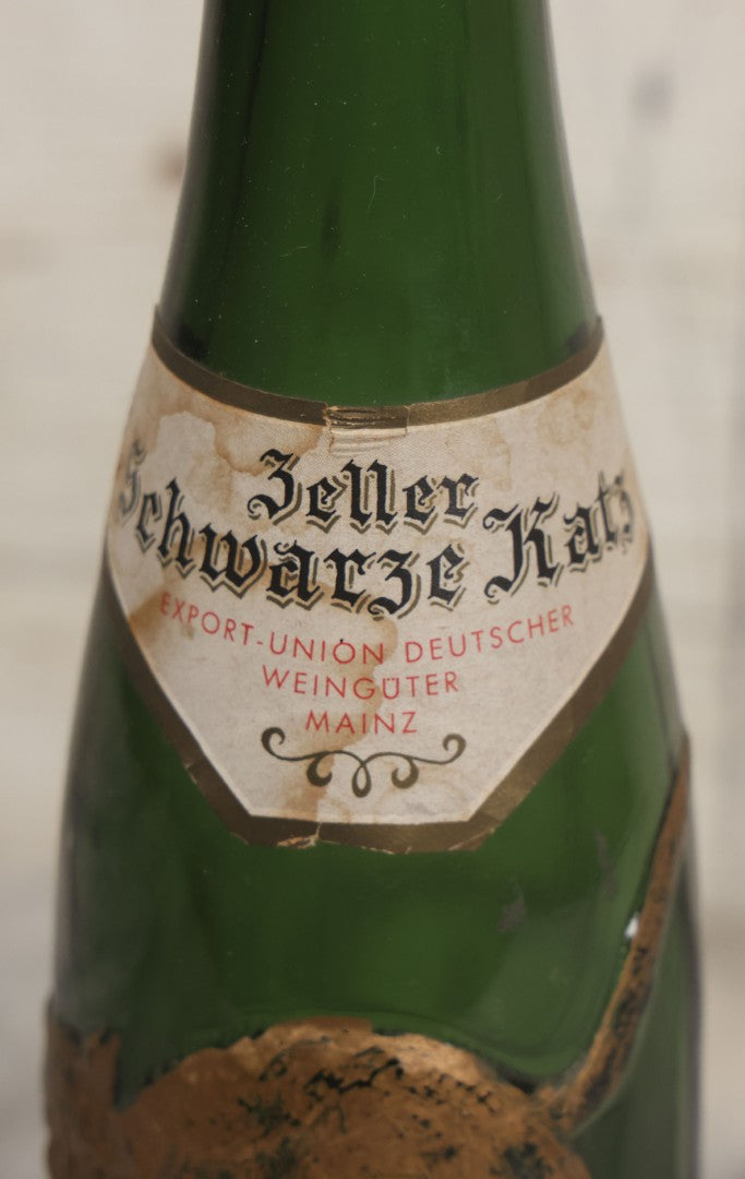 Lot 043 - Vintage Green Glass Embossed Wine Bottle With Painted Cat Motif, Zeller Schwarze Katz, Light Mosel Wine, Product, Bottled, And Shipped By Export Union Deutscher Weinguter, Mainz, Germany, 1966