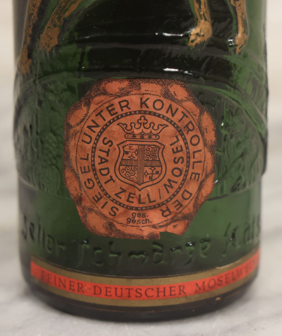 Lot 043 - Vintage Green Glass Embossed Wine Bottle With Painted Cat Motif, Zeller Schwarze Katz, Light Mosel Wine, Product, Bottled, And Shipped By Export Union Deutscher Weinguter, Mainz, Germany, 1966