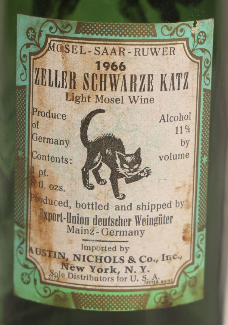 Lot 043 - Vintage Green Glass Embossed Wine Bottle With Painted Cat Motif, Zeller Schwarze Katz, Light Mosel Wine, Product, Bottled, And Shipped By Export Union Deutscher Weinguter, Mainz, Germany, 1966
