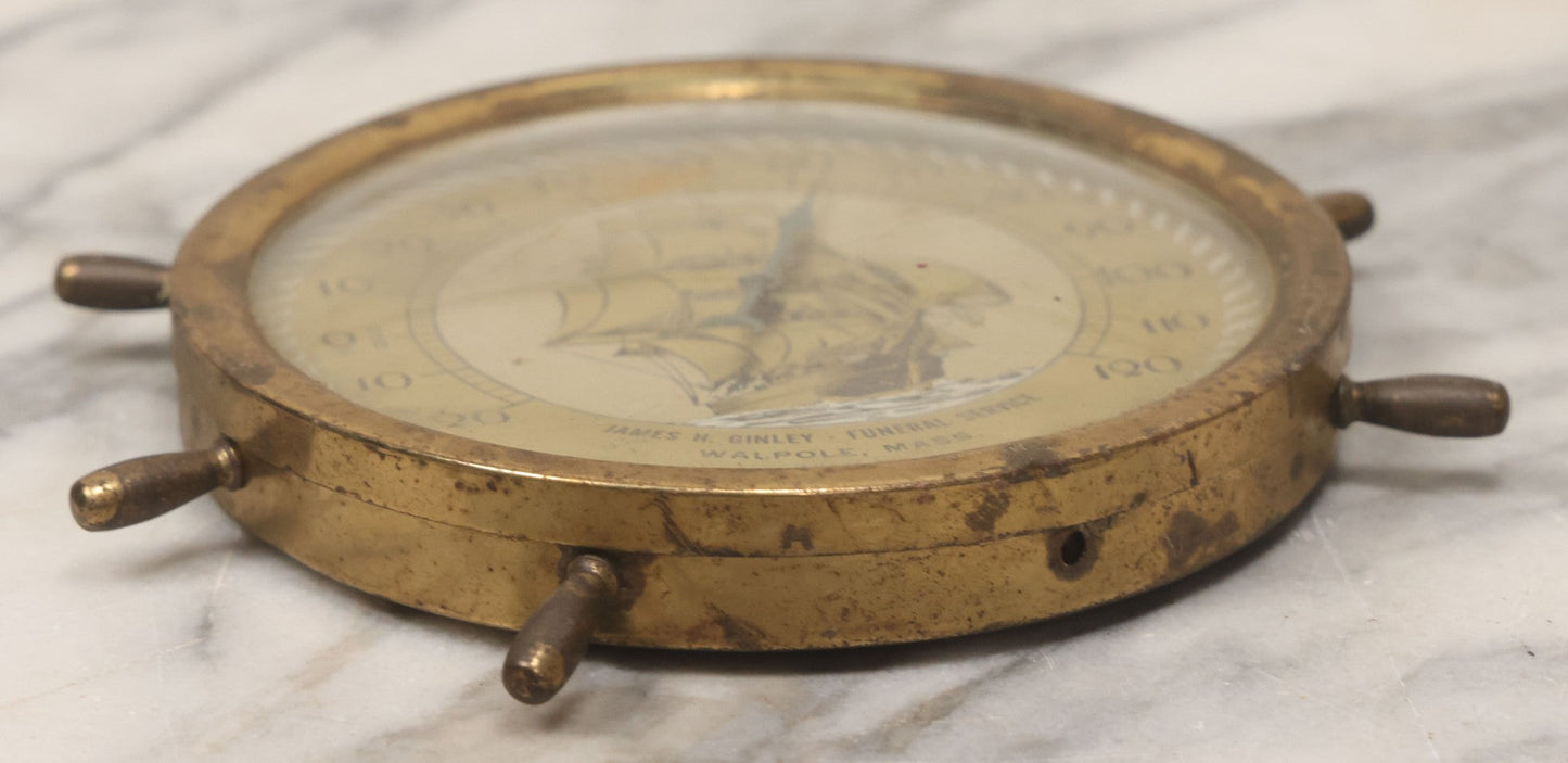 Lot 045 - Vintage Brass Advertising Thermometer With Nautical Motifs, Ship Wheel, Advertising James H. Ginley, Funeral Service, Walpole, Massachusetts
