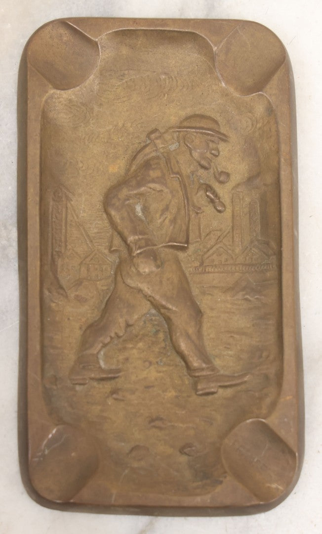Lot 046 - Vintage Cast Brass Ashtray With Walking Miner Smoking Pipe, Carrying Pickaxe, World War Two Era, Stamped France, 1945, Depose